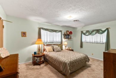 This home features a double lot and an oversized garage so you