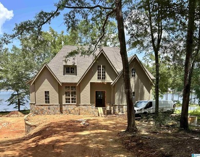 Rare opportunity to own a stunning new construction waterfront - photo 2