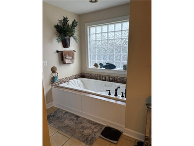 Discover your own private retreat in this elegant 4-bedroom - photo 21