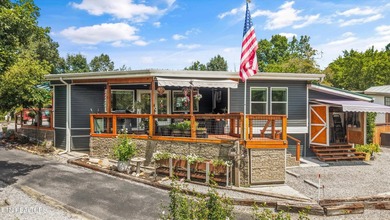 Experience mountain living at its finest in the highly - photo 3