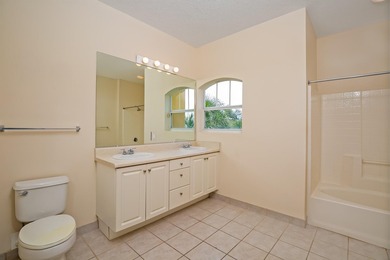 Discover easy coastal living in this beautifully maintained - photo 13