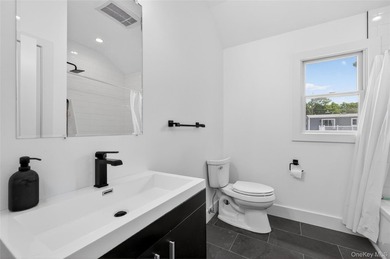 A Diamond, Completely Remodeled Colonial Located Mid-Block in - photo 21