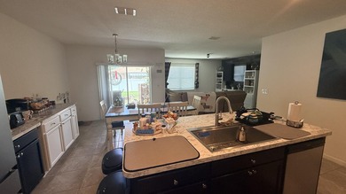 Welcome to this charming 4-bedroom, 2-bathroom home located in - photo 6