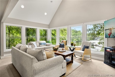 Discover peace and tranquility in this stunning lakefront home - photo 13