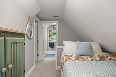 Discover peace and tranquility in this stunning lakefront home - photo 22