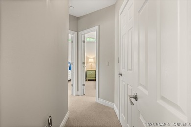 Discover peace and tranquility in this stunning lakefront home - photo 24