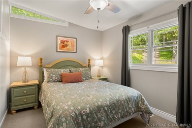Discover peace and tranquility in this stunning lakefront home - photo 25
