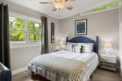 Discover peace and tranquility in this stunning lakefront home - photo 29