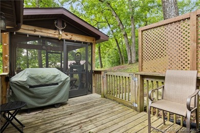 Discover peace and tranquility in this stunning lakefront home - photo 31
