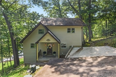 Discover peace and tranquility in this stunning lakefront home - photo 43