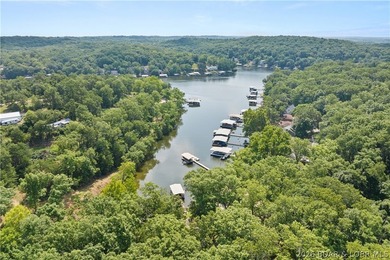 Discover peace and tranquility in this stunning lakefront home - photo 44