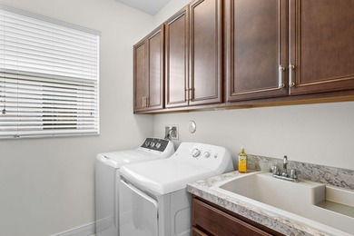 This beautiful home features an open-concept layout with two - photo 9