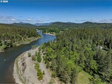 Set along a rare, low-bank stretch of the Rogue River within a - photo 2