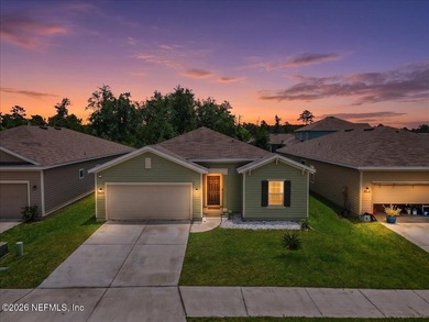 Welcome home to this charming 3-bedroom, 2-bath residence in - photo 3