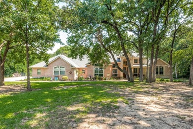 Custom, one-story, 5 bed, 3bath home on an acre of wooded land - photo 2
