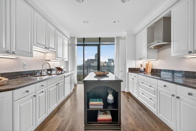 Experience effortless Buckhead living with skyline and green