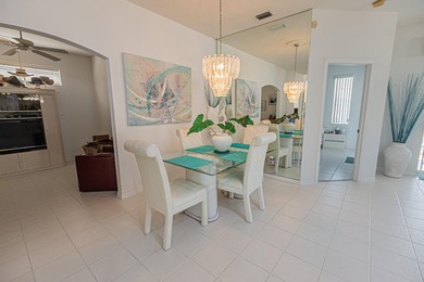 Located in the gated 55+ active community of Kings Isle, this - photo 5