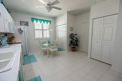 Located in the gated 55+ active community of Kings Isle, this - photo 8