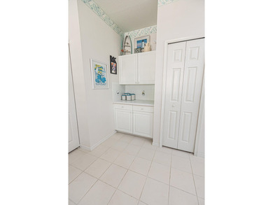 Located in the gated 55+ active community of Kings Isle, this - photo 9