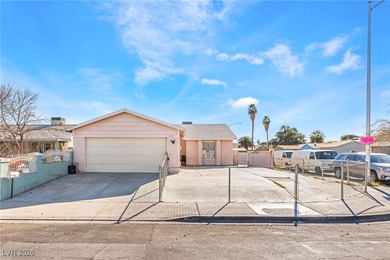 Corner lot with no HOA! This single-family home features an open