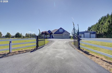 Custom home with something for everyone. As you enter the gated - photo 1