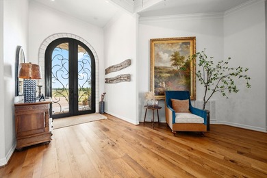 This fully remodeled 6,514 square foot estate offers an - photo 2