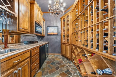 This fully remodeled 6,514 square foot estate offers an - photo 4