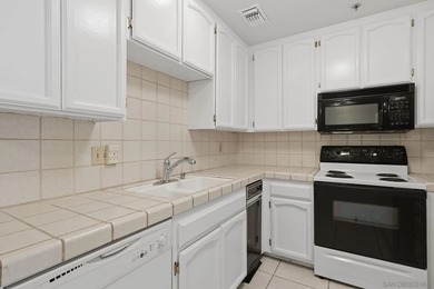 Welcome to this beautifully maintained top-floor corner unit in - photo 20