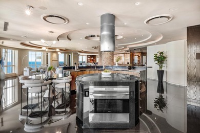 Perched atop the prestigious Excelsior Condominium, this - photo 5
