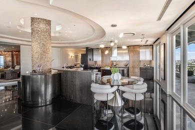 Perched atop the prestigious Excelsior Condominium, this - photo 7