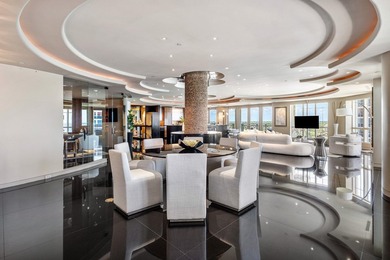 Perched atop the prestigious Excelsior Condominium, this - photo 8