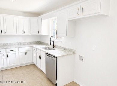 This beautifully updated 4-bedroom, 2-bath home is located in a - photo 10
