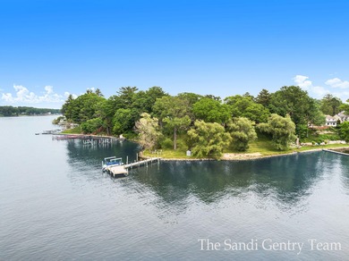 WITH OVER 400' OF PRIME SPRING LAKE WATER FRONTAGE SITS THIS - photo 6