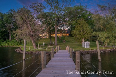 WITH OVER 400' OF PRIME SPRING LAKE WATER FRONTAGE SITS THIS - photo 7