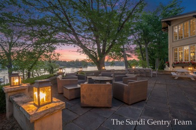 WITH OVER 400' OF PRIME SPRING LAKE WATER FRONTAGE SITS THIS - photo 9
