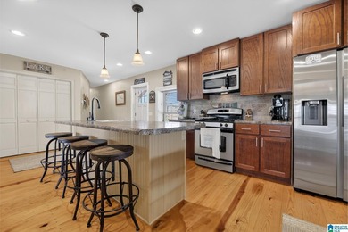 Welcome to The Nest. This Oasis is fully remodeled with hardwood - photo 6