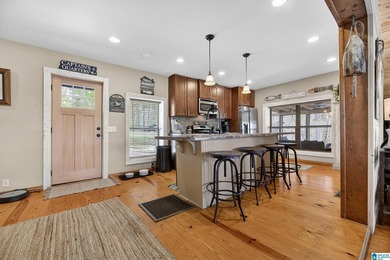 Welcome to The Nest. This Oasis is fully remodeled with hardwood - photo 8