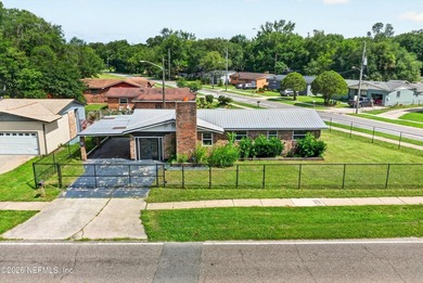 This solid brick 3-bedroom, 2-bath home offers the perfect blend - photo 1