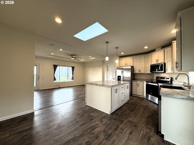 Experience coastal living at its finest in this beautifully