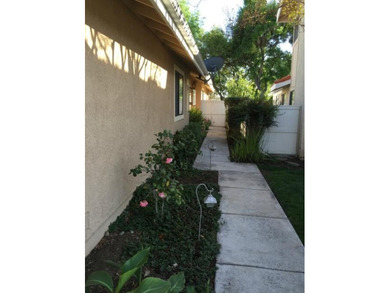 This lovely single story condominium is located on the 12th