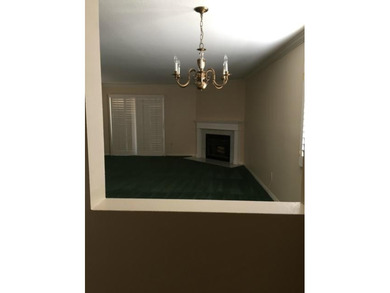 This lovely single story condominium is located on the 12th