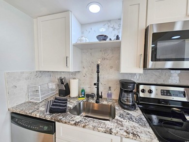 LUXURY ON A LOW FLOOR! This residence was completely remodeled - photo 18