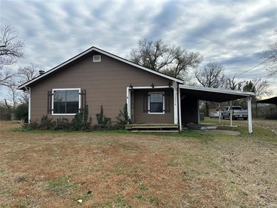 Lake Home For Sale in Okmulgee, Oklahoma