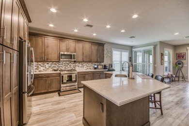 Beautifully upgraded 2023 Bimini Model lakefront home featuring - photo 4