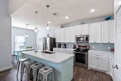 Fully Furnished & Ready for Fun! This ideally located retreat is - photo 2