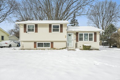 Welcome to this well-maintained 4-bedroom tri-level home located
