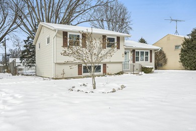 Welcome to this well-maintained 4-bedroom tri-level home located