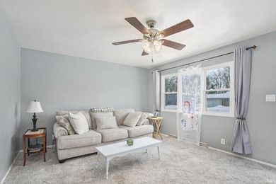 Welcome to this well-maintained 4-bedroom tri-level home located