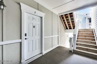 This desirable end-unit condominium offers a light-filled layout