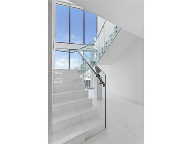 Aston Martin Residences, 5002. Enter through the East Tower into